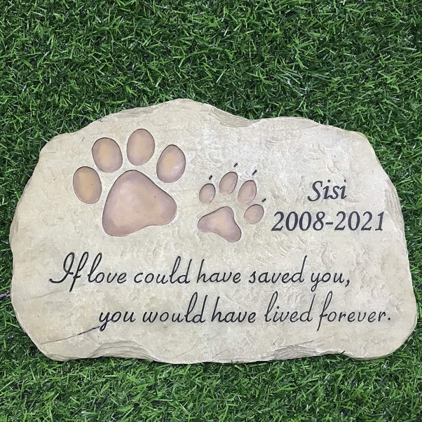 Heartfelt pet memorial stone with engraved paw prints, custom text, and a touching poem, made of durable resin for garden or home display